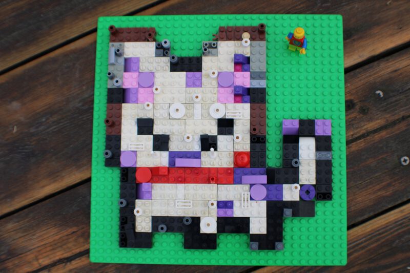 A LEGO Brick mural that looks like a cat