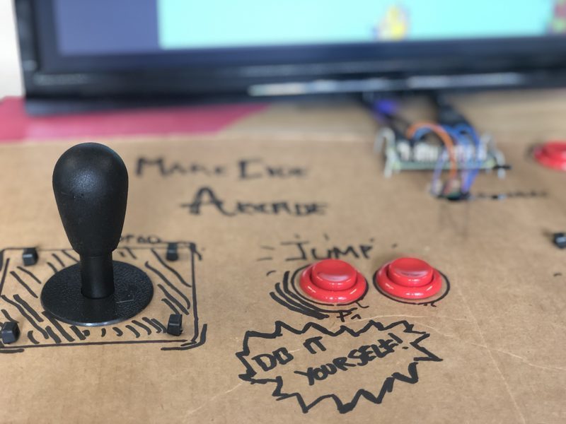 An Arcade control panel made of cardboard